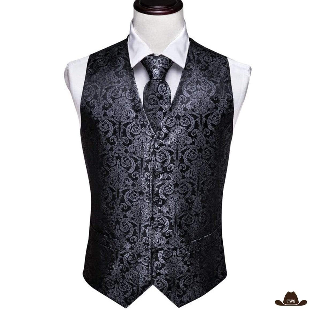 Black paisley vest and tie on a mannequin.