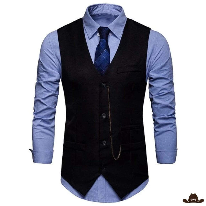 A black vest and blue shirt with tie.
